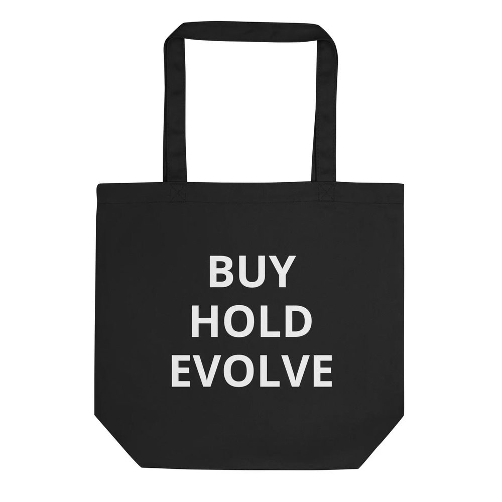 Katoenen tote bag met de tekst buy hold evolve